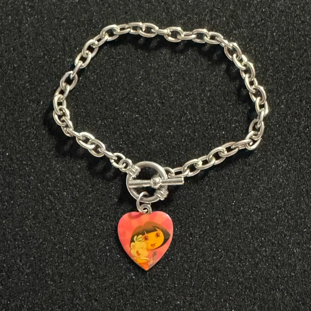 Dora the Explorer charm Bracelet 3 inches diameter 8 inches long